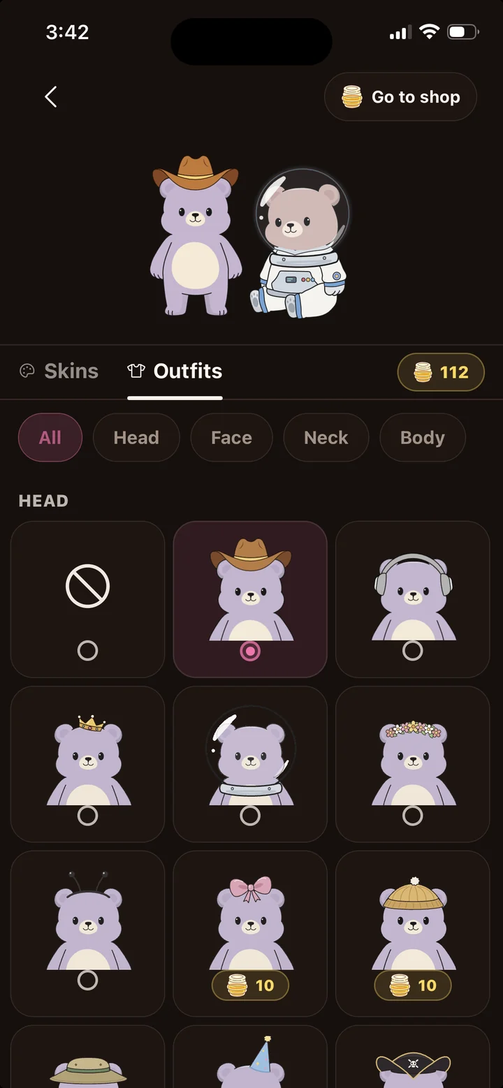 The Den closet, where a purple bear in a cowboy hat and a bear in an astronaut suit try on hats